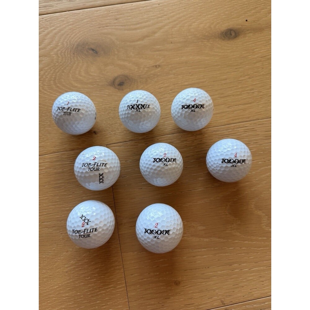 8 Top flite golf balls See photos